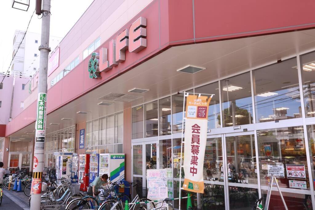 Апартаменты Sanacion Motomachi 7 なんばで150平米の広々空間 最大14名 Netflix見れます Осака Экстерьер фото